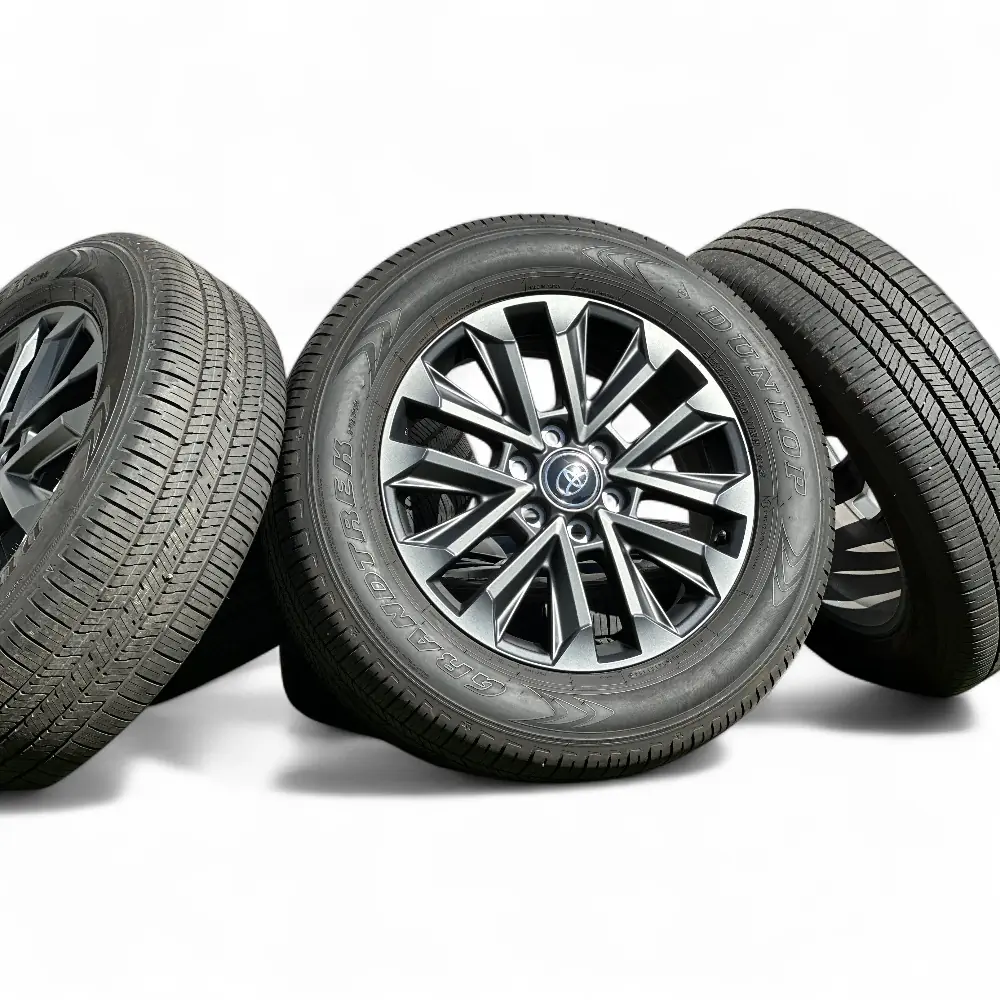 Toyota + Dunlop - Toyota 12 Spoke Powder Coat Charcoal 20x7.5 Wheels 6x139.7 Rims with Dunlop Grandtrek PT22 265/60R20 Tires - package - 20.0" diameter - 6x139.7