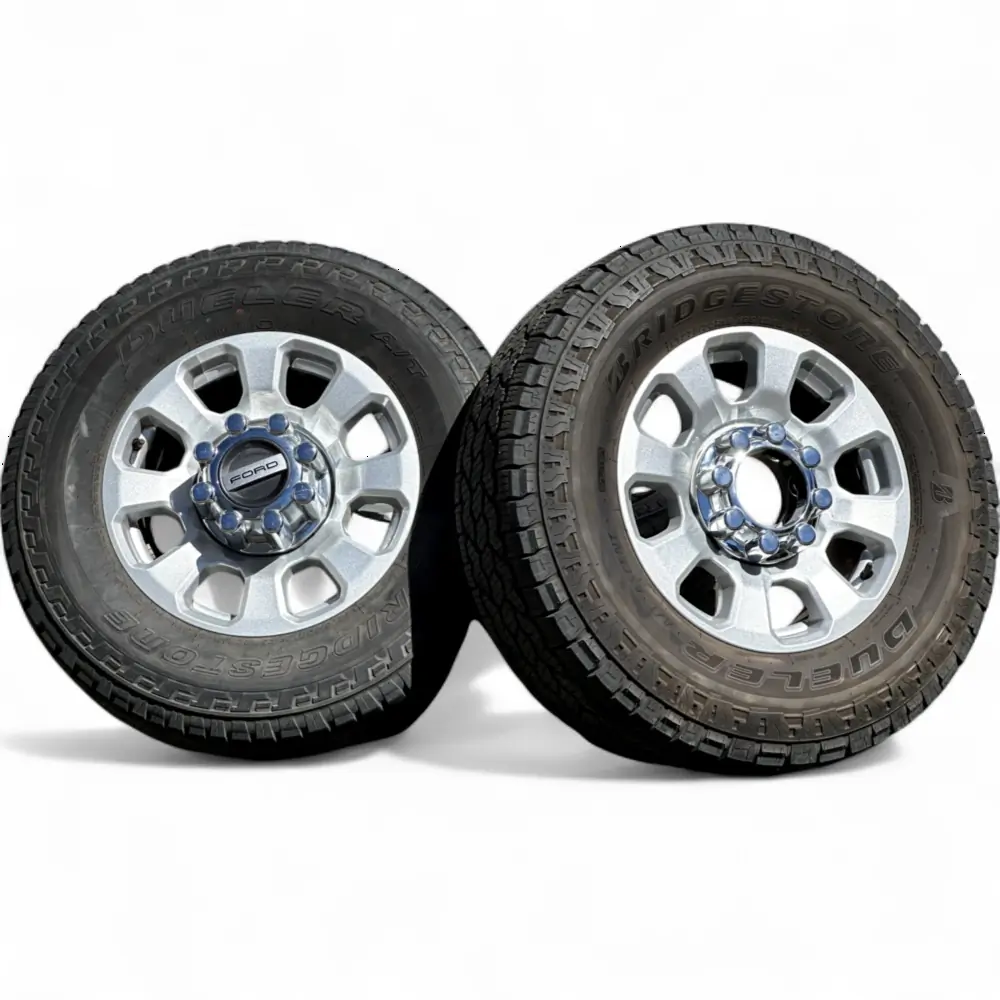 Ford + Bridgestone Ford 8 Spoke Silver 18x8.0 Wheels 8x170 Rims with Bridgestone Dueler A/T Ascent 275/70R18 Tires Wheel & Tire Package - View 2