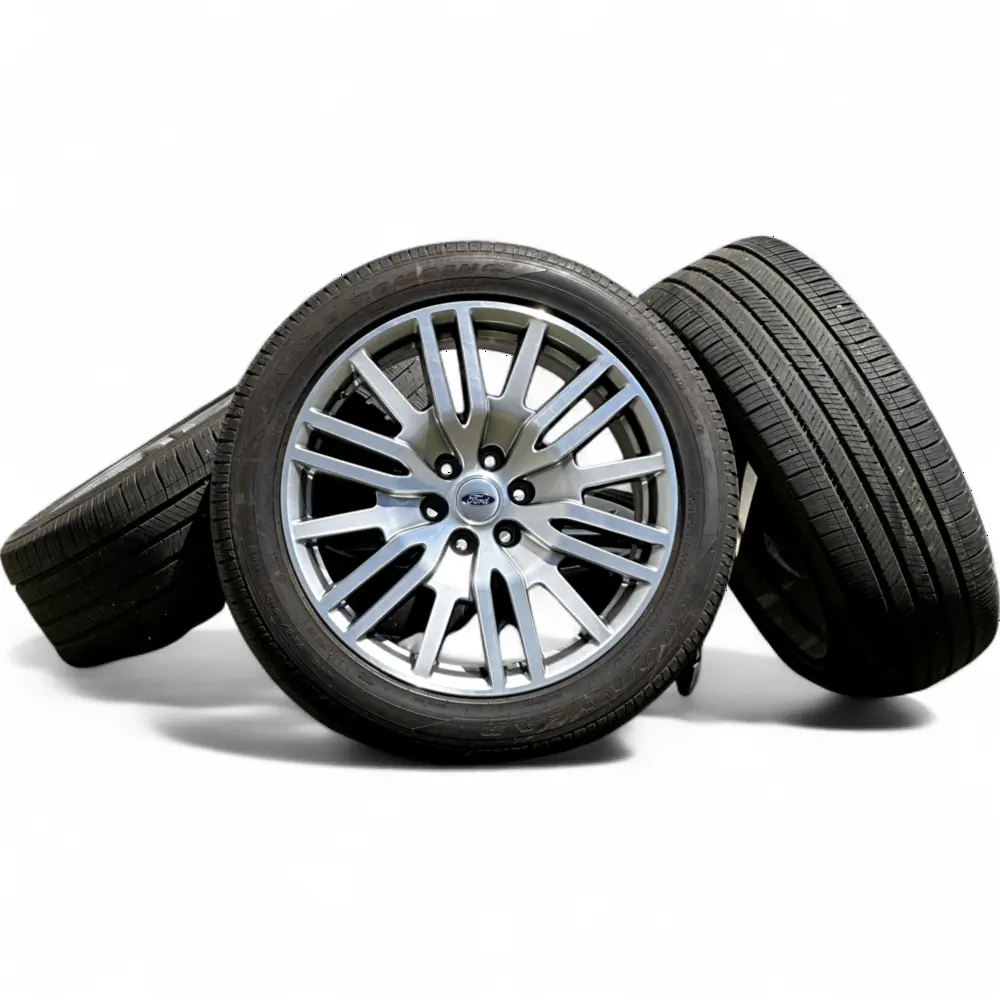 Ford + Goodyear - Ford 18 Spoke Silver Machined 22x9.5 Wheels 6x135 Rims with Goodyear Eagle Touring 285/45R22 Tires - package - 22.0" diameter - 6x135