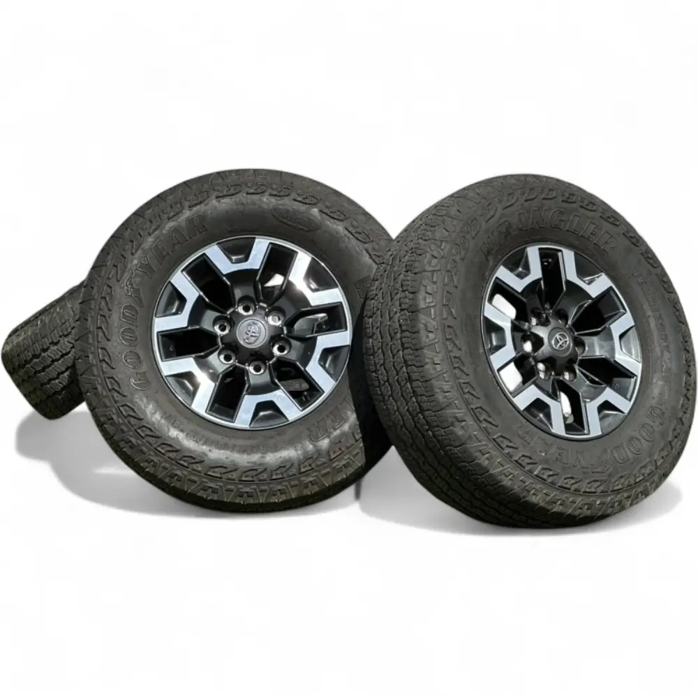 Toyota + Goodyear Toyota 6 Spoke Charcoal Machined 16x7.0 Wheels 6x139.7 Rims with Goodyear Wrangler Territory AT  Kevlar 265/70R16 Tires Wheel & Tire Package - View 2