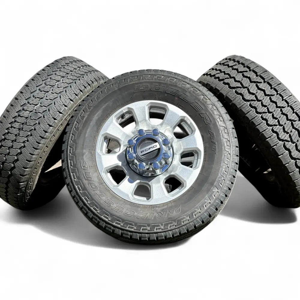 Ford 8 Spoke Silver 18x8.0 Wheels 8x170 Rims with Bridgestone Dueler A/T Ascent 275/70R18 Tires Ford + Bridgestone Ford 8 Spoke Silver 18x8.0 Wheels 8x170 Rims with Bridgestone Dueler A/T Ascent 275/70R18 Tires Wheel & Tire Package