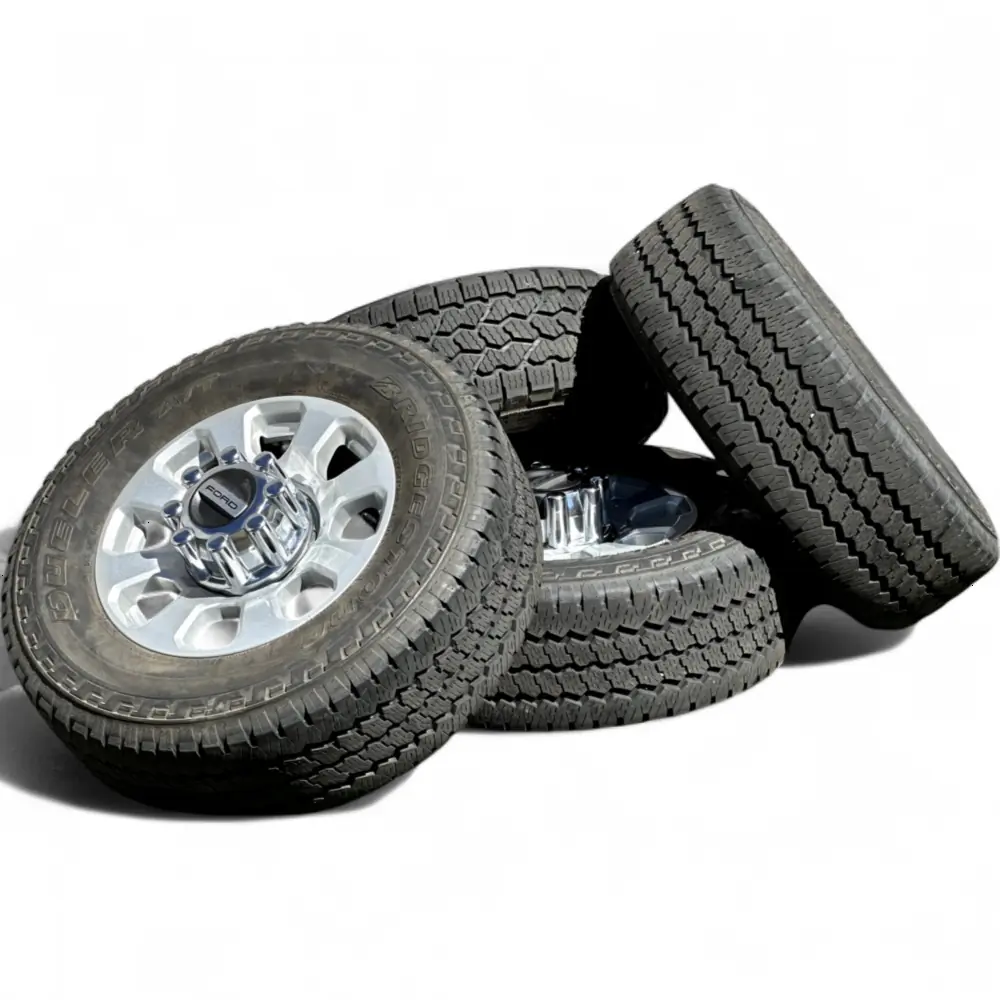 Ford + Bridgestone Ford 8 Spoke Silver 18x8.0 Wheels 8x170 Rims with Bridgestone Dueler A/T Ascent 275/70R18 Tires Wheel & Tire Package - View 3