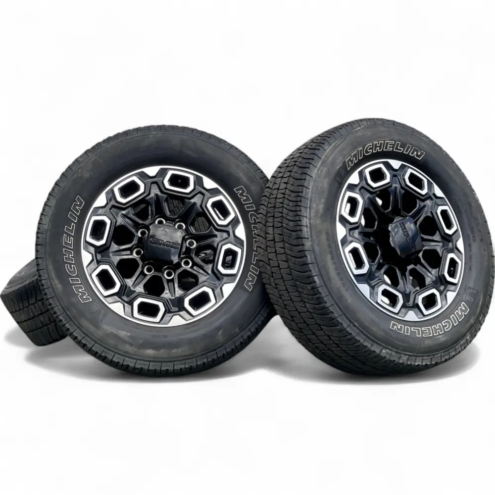 GMC + Michelin GMC 16 Slot Black Machined 20x8.5 Wheels 8x180 Rims with Michelin LTX A/T 2 275/65R20 Tires Wheel & Tire Package - View 3