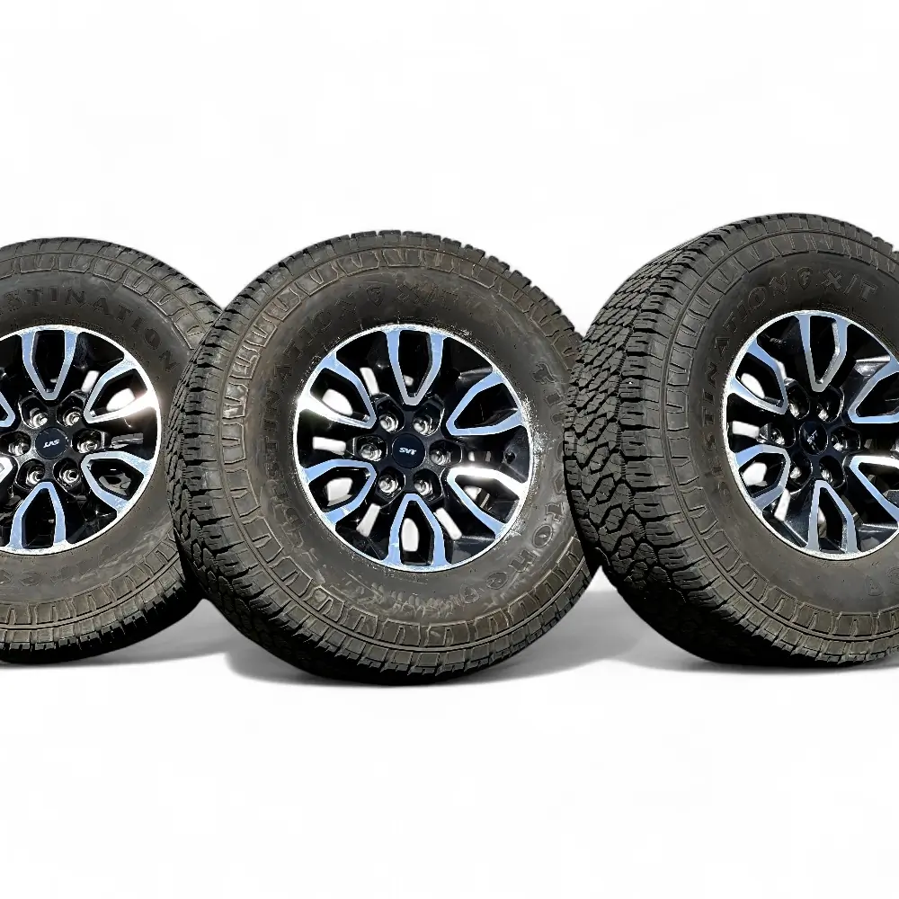 Ford + Firestone Ford 12 Spoke Black Machined 17x8.5 Wheels 6x135 Rims with Firestone Destination X/T 315/70R17 Tires Wheel & Tire Package - View 2