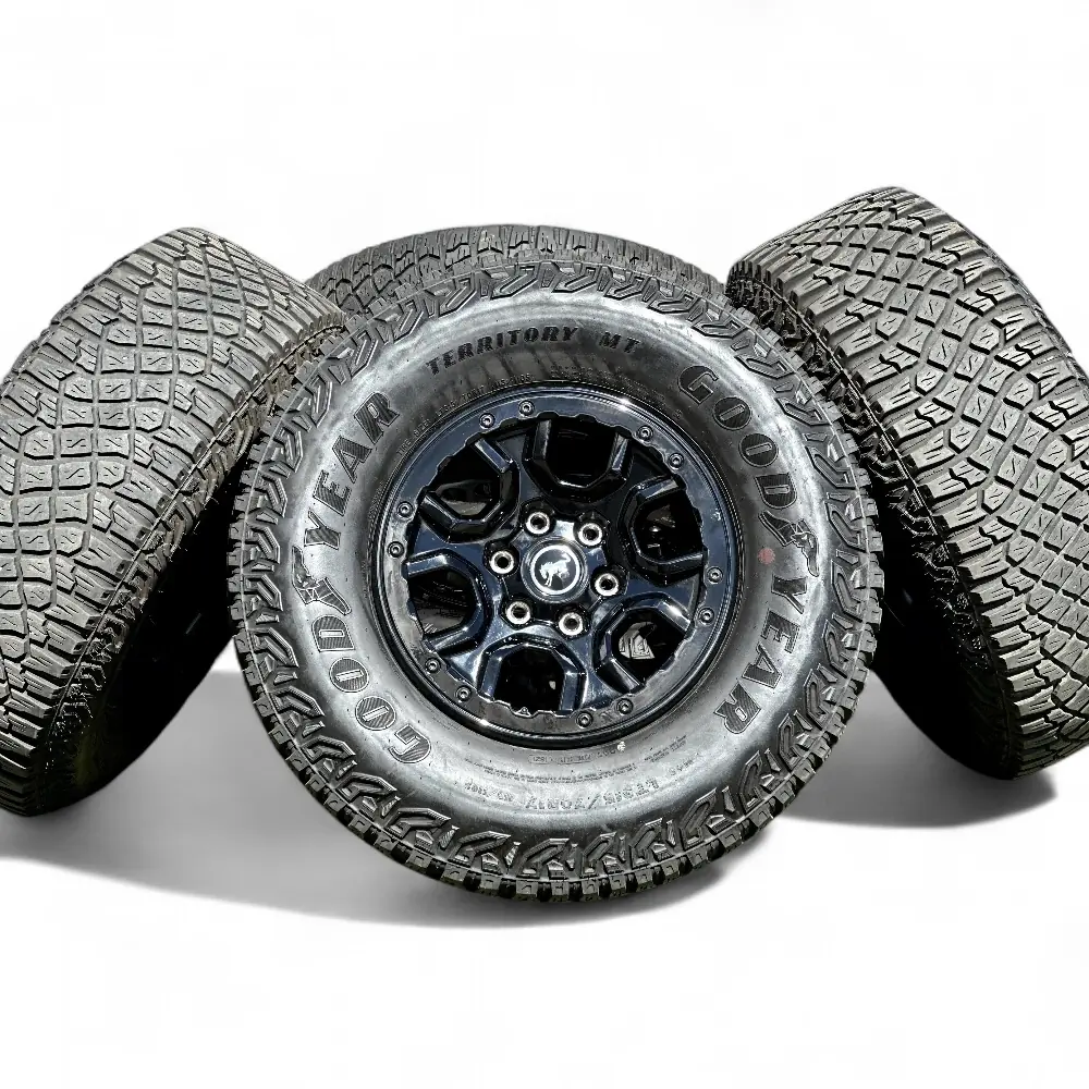 Ford + Goodyear Ford 6 Spoke Powder Coat Black 17x8.5 Wheels 6x139.7 Rims with Goodyear Wrangler Territory MT 315/70R17 Tires Wheel & Tire Package - View 4