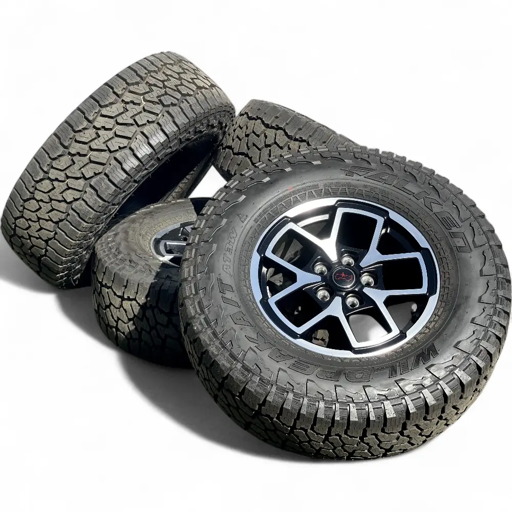 Jeep + Falken Jeep 10 Spoke Black Machined 17x7.5 Wheels 5x127 Rims with Falken Wildpeak A/T3W 285/70R17 Tires Wheel & Tire Package - View 3