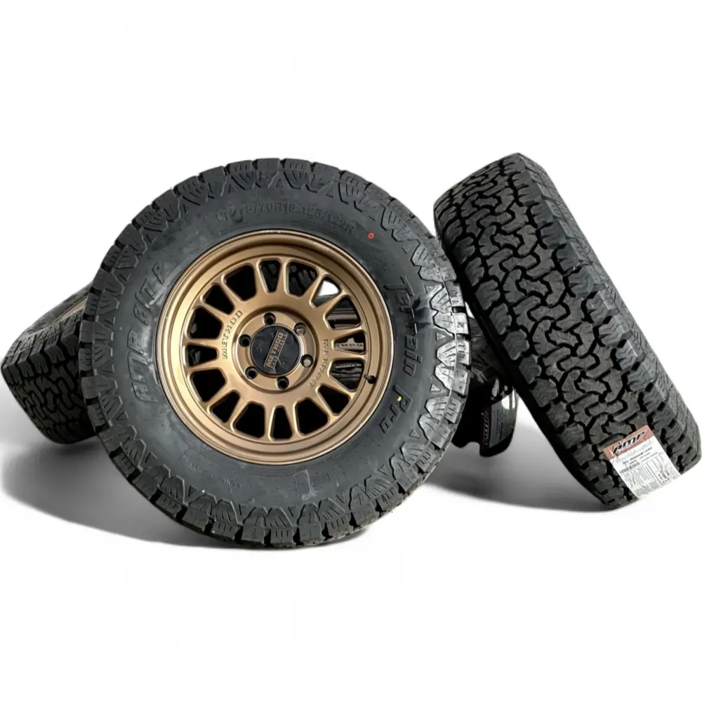 Method MR318 Method Bronze 18x9.0 Wheels 6x139.7 Rims with AMP Terrain Pro A/T LT275/70R18 Tires Method + AMP Method MR318 Method Bronze 18x9.0 Wheels 6x139.7 Rims with AMP Terrain Pro A/T LT275/70R18 Tires Wheel & Tire Package