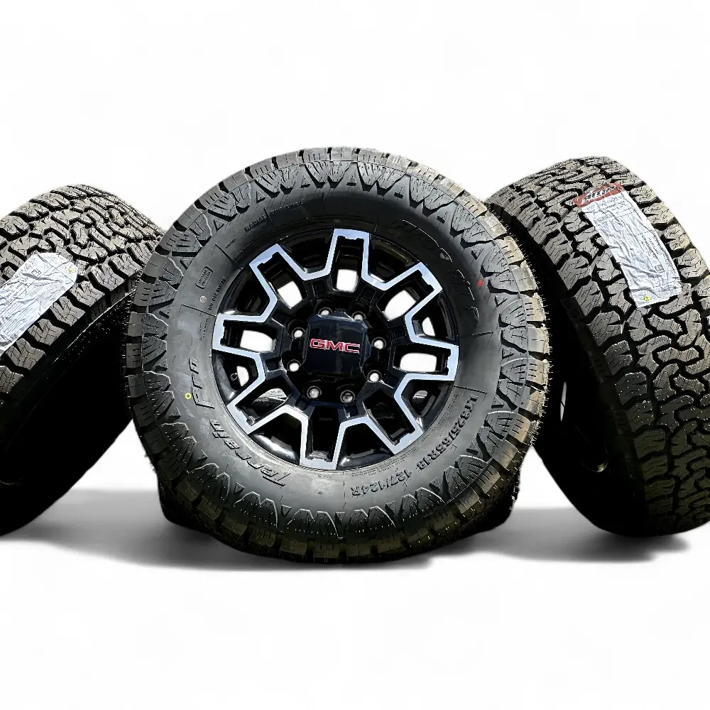 GMC + AMP - GMC 8 Split Spoke Black Machined 18x9.0 Wheels 8x180 Rims with AMP Terrain Pro A/T LT325/65R18 Tires - package - 18.0" diameter - 8x180