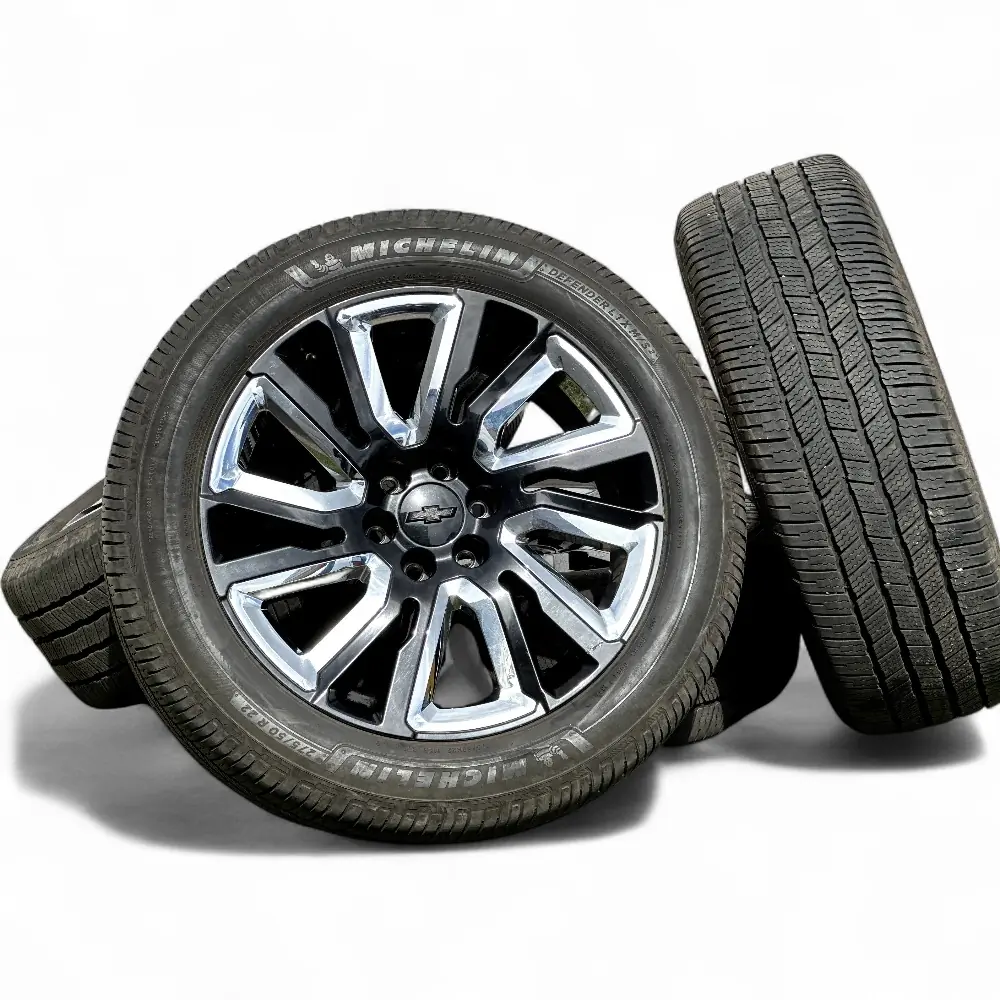 GMC + Michelin - GMC 12 Spoke Powder Coat Black 22x9.0 Wheels 6x139.7 Rims with Michelin Defender LTX M/S2 275/50R22 Tires - package - 22.0" diameter - 6x139.7