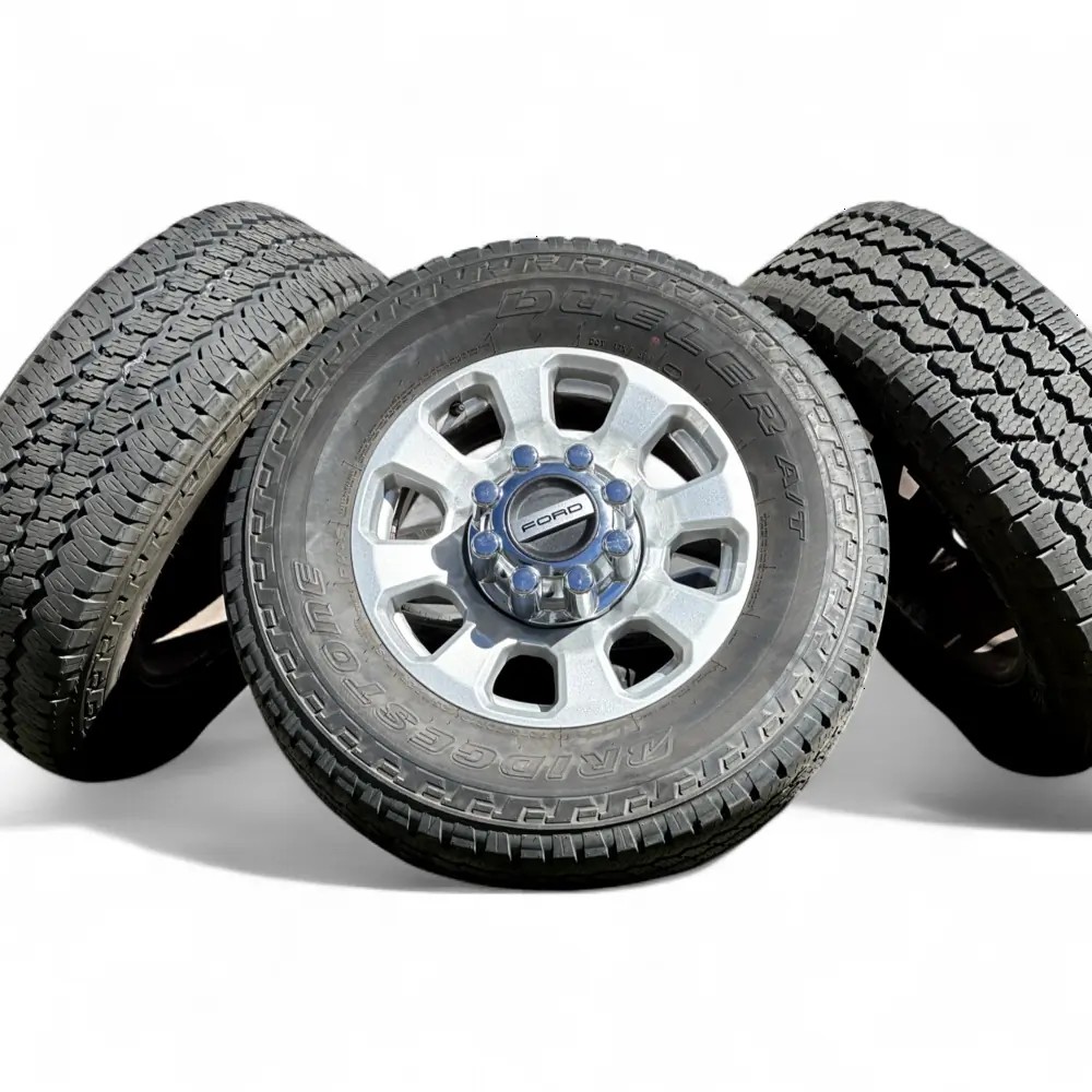 Ford + Bridgestone Ford 8 Spoke Silver 18x8.0 Wheels 8x170 Rims with Bridgestone Dueler A/T Ascent 275/70R18 Tires Wheel & Tire Package - View 6