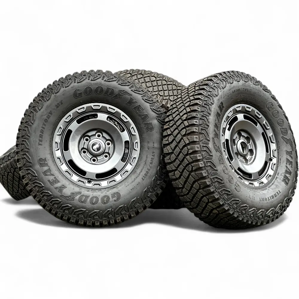 Ford + Goodyear Ford 6 Slot Powder Coat Charcoal 17x8.5 Wheels 6x139.7 Rims with Goodyear Wrangler Territory MT 315/70R17 Tires Wheel & Tire Package - View 4